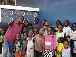 The children outside their new building